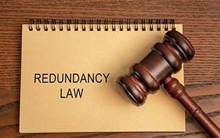 HR and legal team managing collective redundancy consultation process in the UK