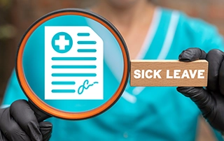 HR manager reviewing employee sick pay policy and SSP documentation