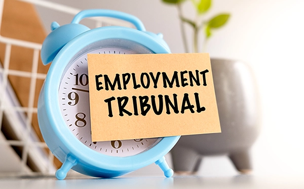 Employer reviewing Employment Tribunal time limits and HR records